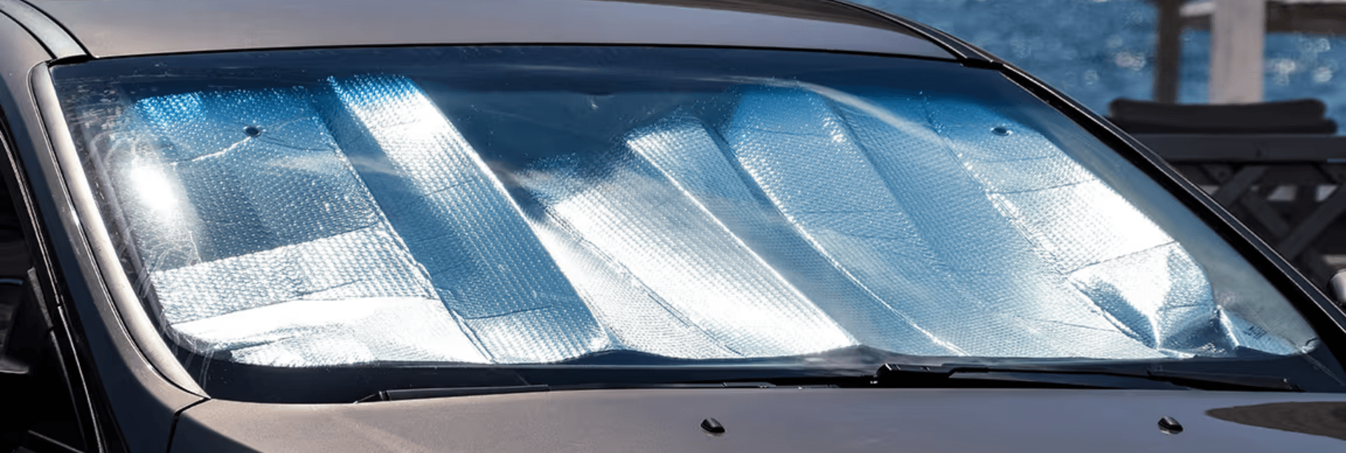 Windshield protected with sunscreen interior sun screen.