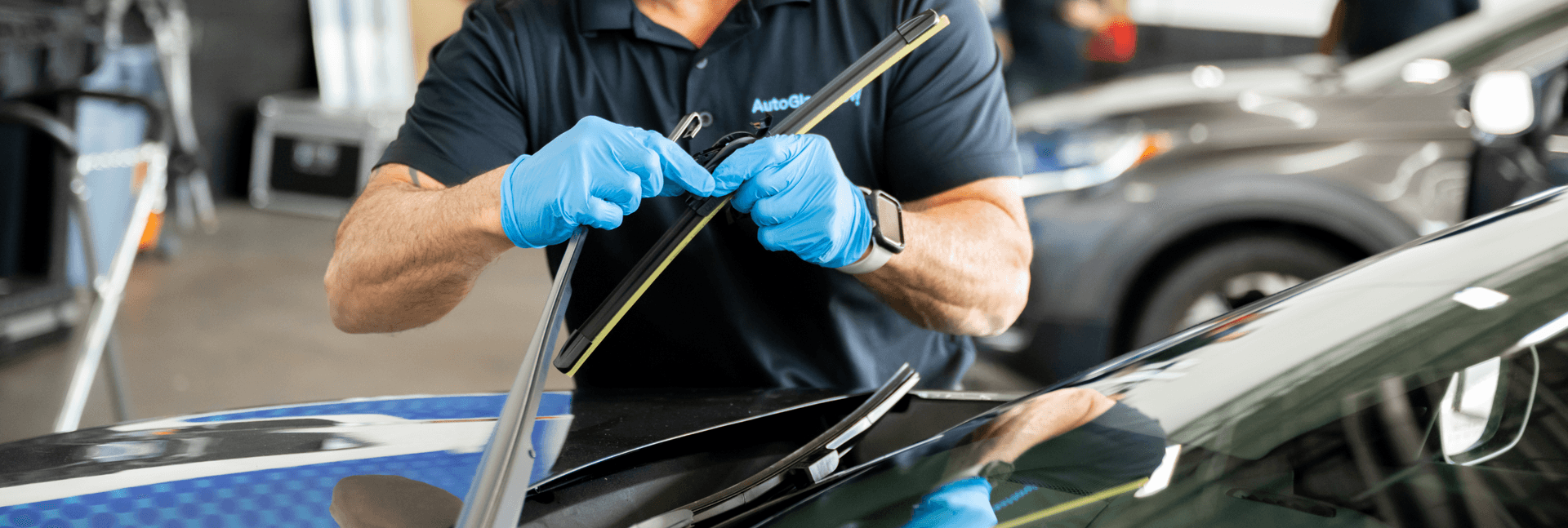 Windshield wiper being installed.