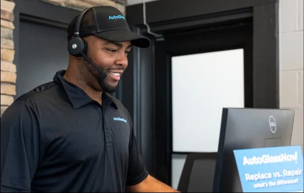 AGN employee on phone